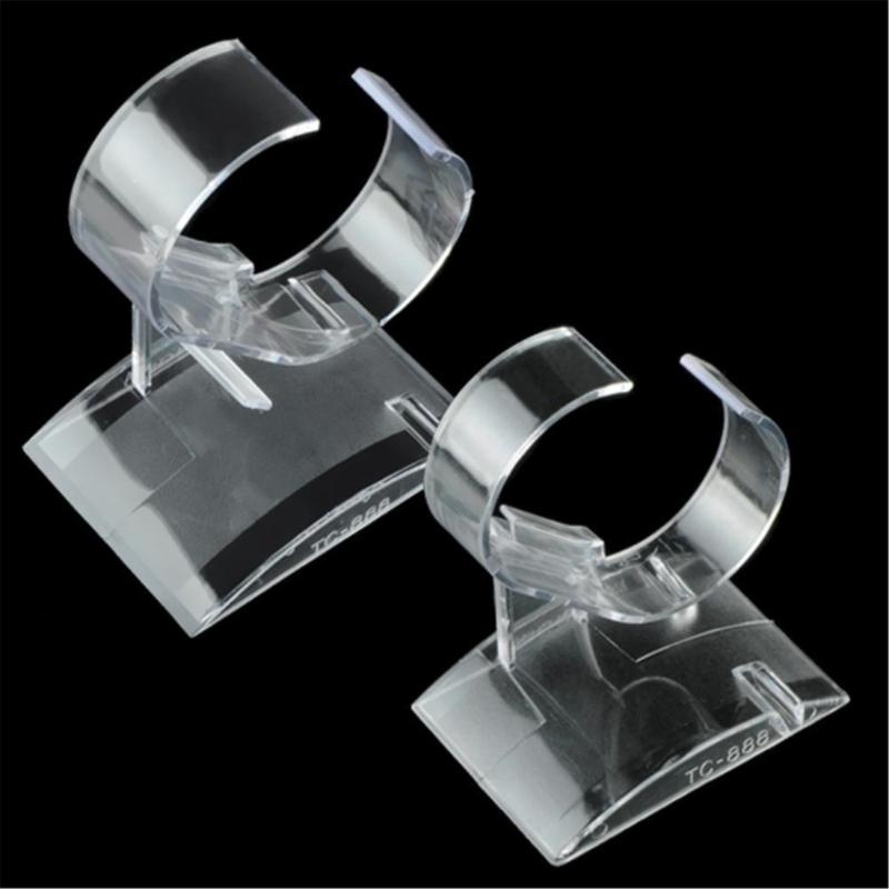 Doorzichtig plastic horlogerek - Jewelry And Watches Inc recensie en prijs